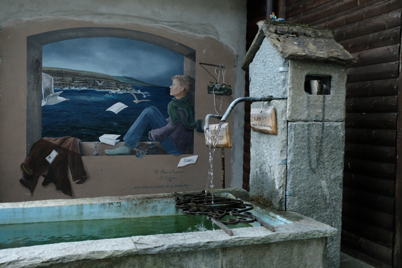 Wandbild am Brunnen Didiero